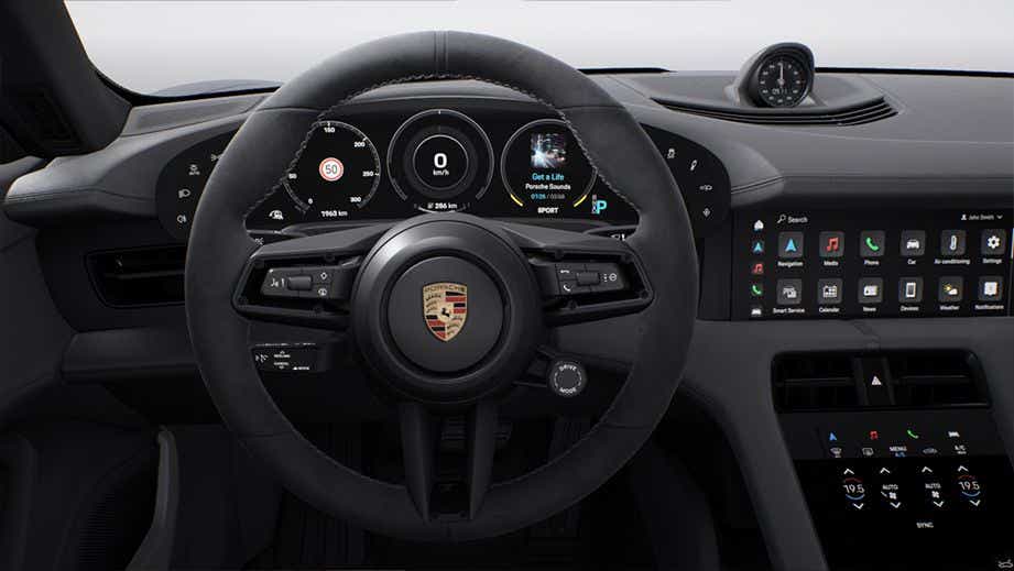 Steering wheel and dashboard of a Porsche Taycan