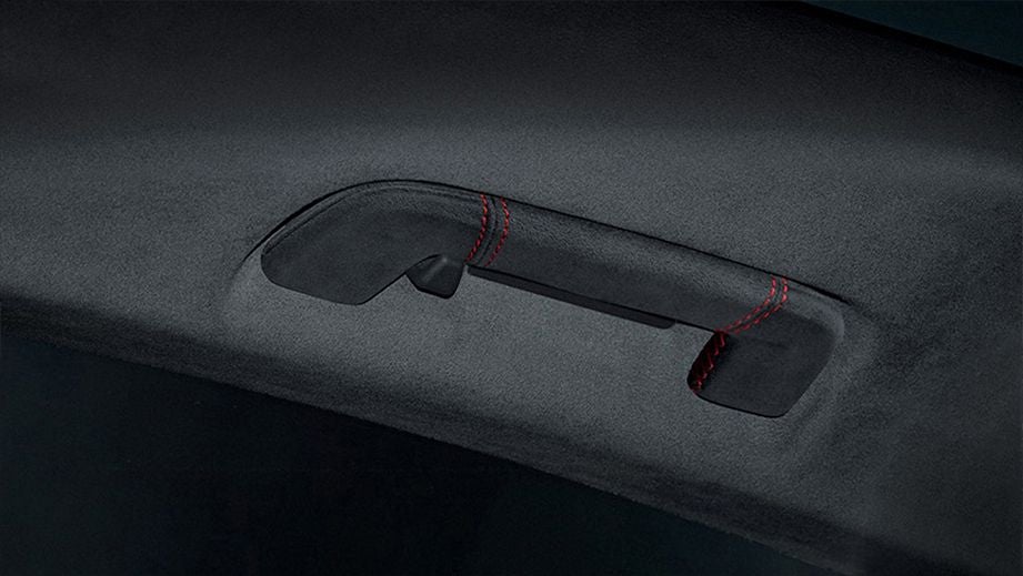 interior grab handle close-up of a Porsche Taycan