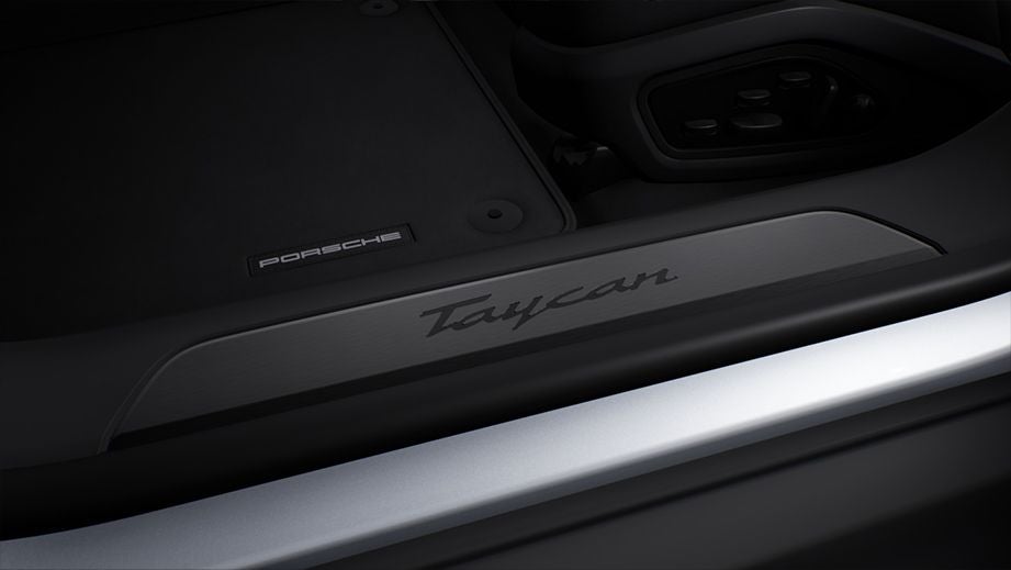 Door sill and interior detail of a Porsche Taycan