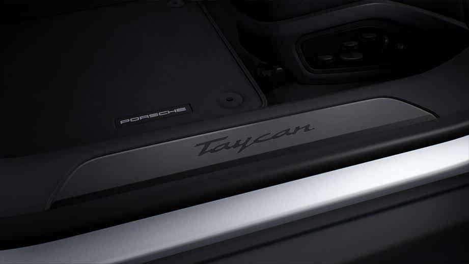 Door sill and interior detail of a Porsche Taycan