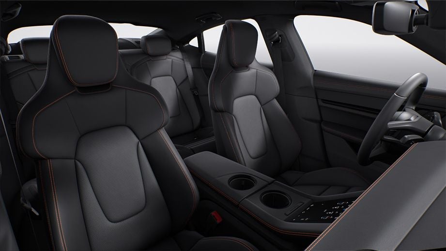front interior seats and dashboard of a Porsche Taycan