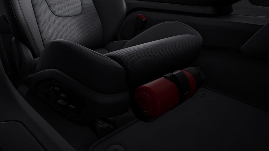 rear seat and center armrest of a Porsche Taycan