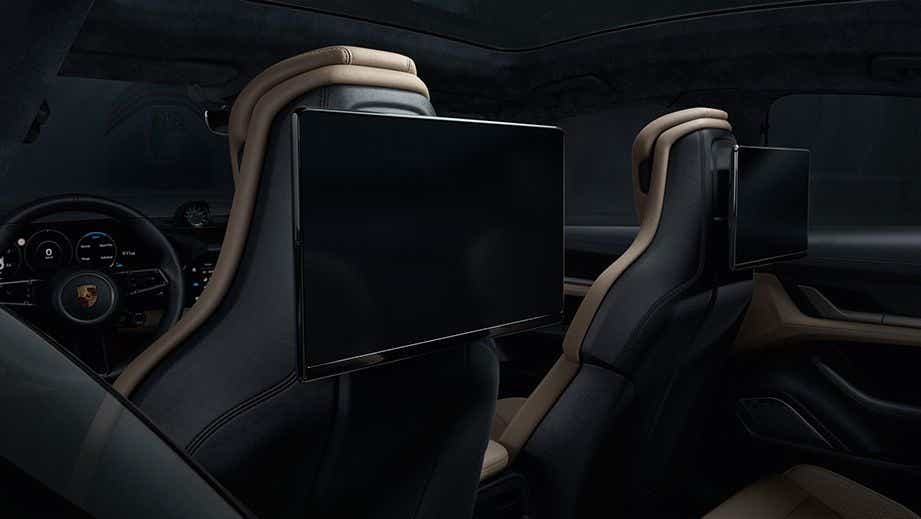 Rear seat entertainment system and dashboard of a Porsche Taycan