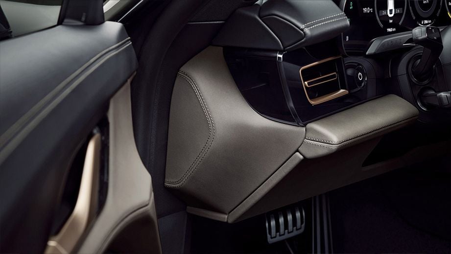 driver footwell and dashboard trim of a Porsche Taycan