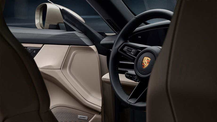 interior dashboard and steering wheel of a Porsche Taycan