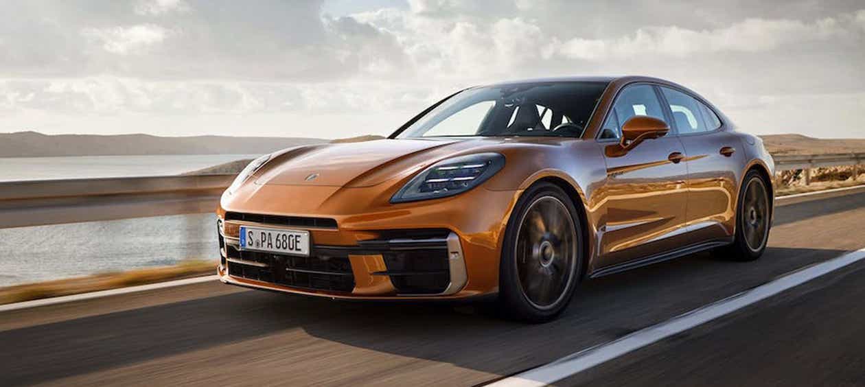 front three-quarter view of a Madeira Gold Metallic Porsche Panamera