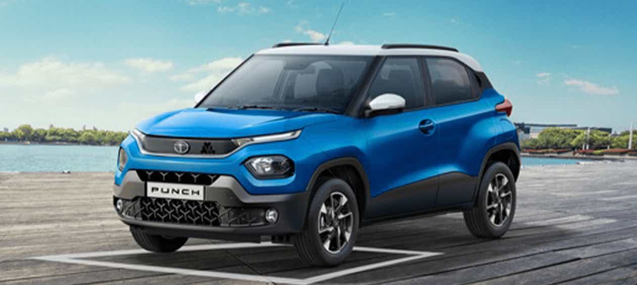 front three-quarter of a Tornado Blue with White Roof Tata Punch