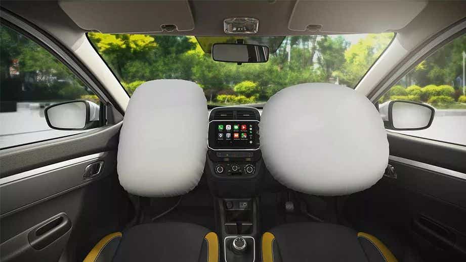 Interior dashboard view with deployed airbags of a Renault KWID