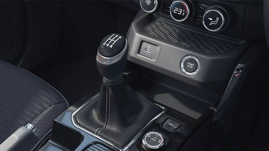 Gear shifter and dashboard controls of a Renault Kiger 2023-2024