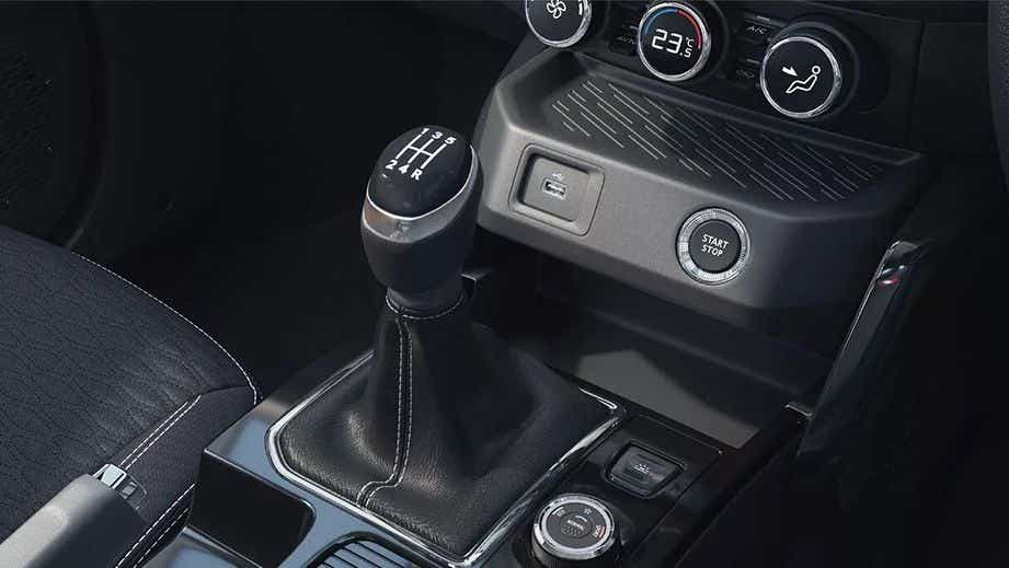 Gear shifter and dashboard controls of a Renault Kiger 2023-2024
