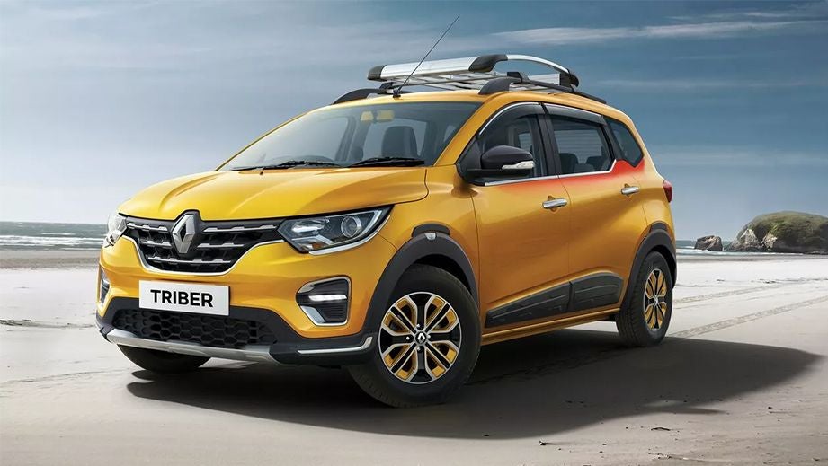 front three-quarter of a Metal Mustard Renault Triber 2019-2024