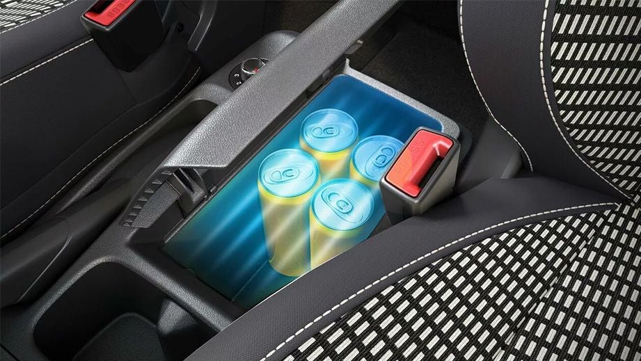 centre console storage with cans in a Renault Triber 2019-2024