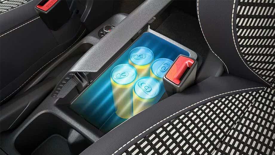 centre console storage with cans in a Renault Triber 2019-2024