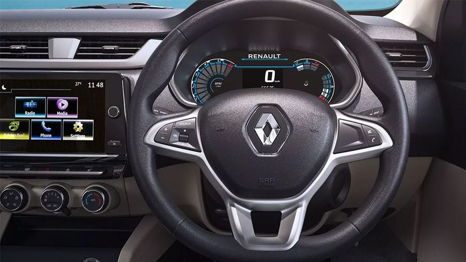 Interior dashboard and steering wheel of a Renault Triber 2019-2024