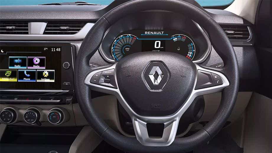 Interior dashboard and steering wheel of a Renault Triber 2019-2024