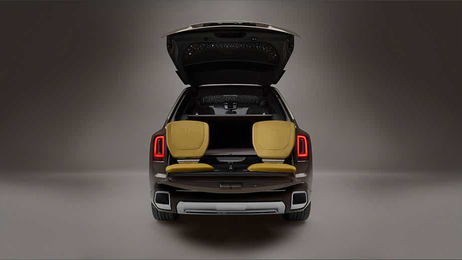 rear view of a Rolls-Royce Cullinan Series II with open tailgate and rear-facing seats