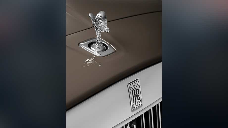Spirit of Ecstasy hood ornament close-up of a Rolls-Royce Cullinan Series II