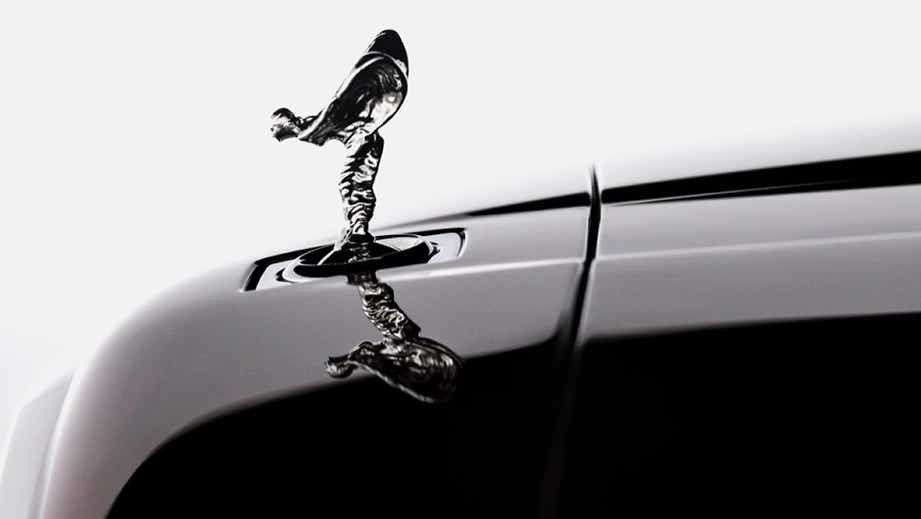 close-up of hood ornament on a Rolls-Royce Cullinan