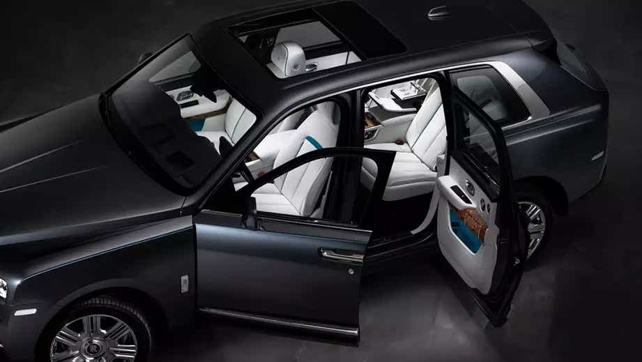 Open side doors showing interior of a Rolls-Royce Cullinan