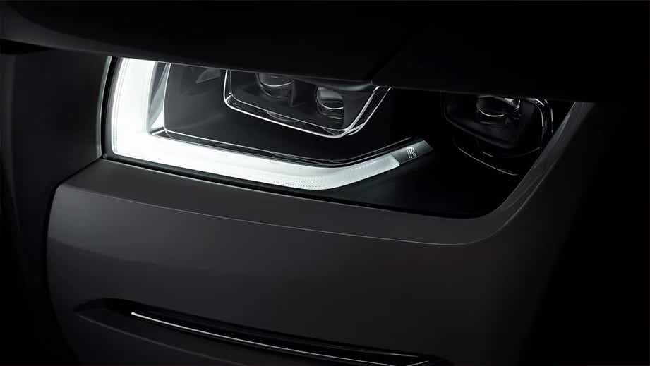headlight close-up of a Rolls-Royce Ghost