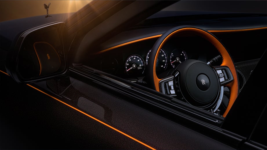 Interior dashboard and steering wheel of a Rolls-Royce Ghost