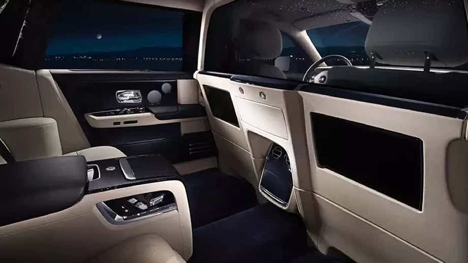 rear seat luxury interior of a Rolls-Royce Phantom