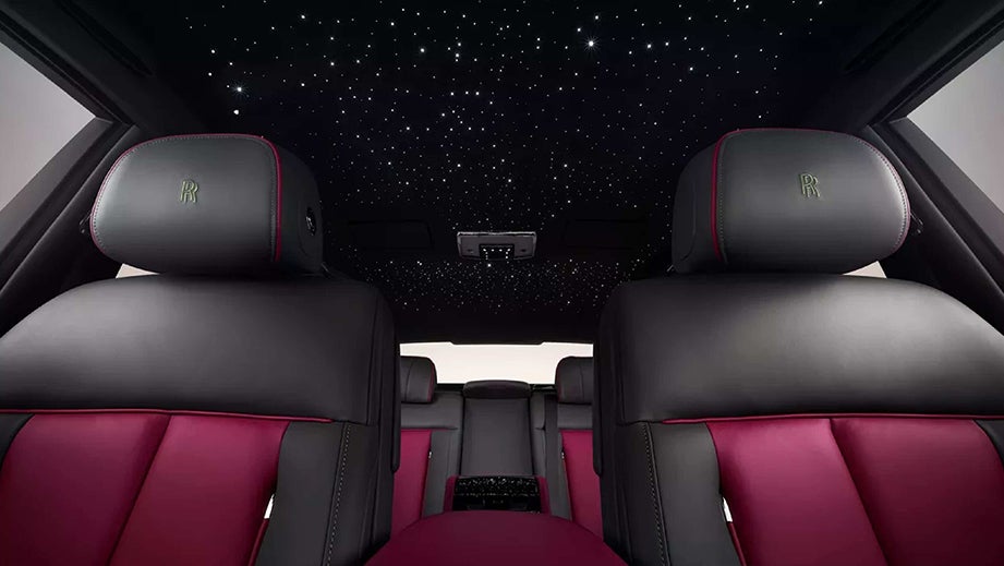 interior front seats and starlight headliner of a Rolls-Royce Phantom