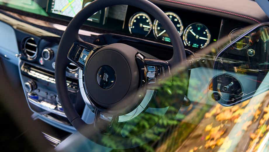 Interior dashboard view of a Rolls-Royce Phantom