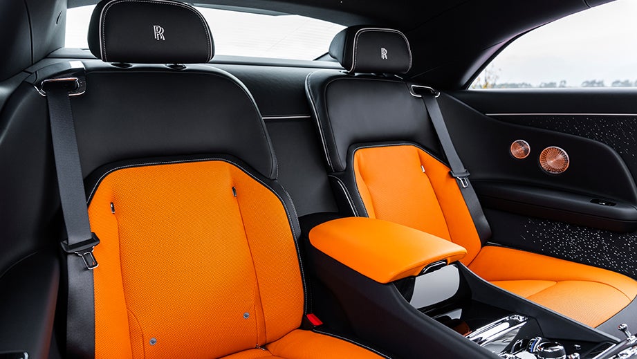 Rear seat interior view of a Rolls-Royce Spectre