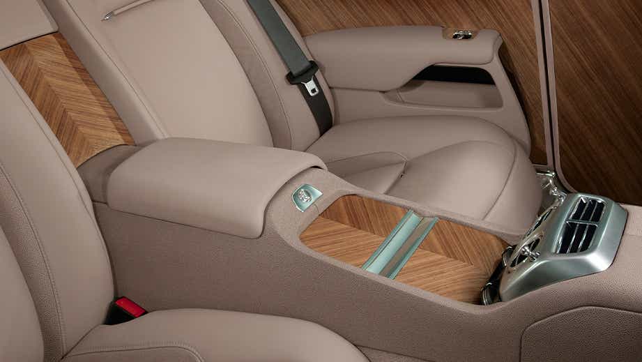 Interior rear seat and center console of a Rolls-Royce Wraith