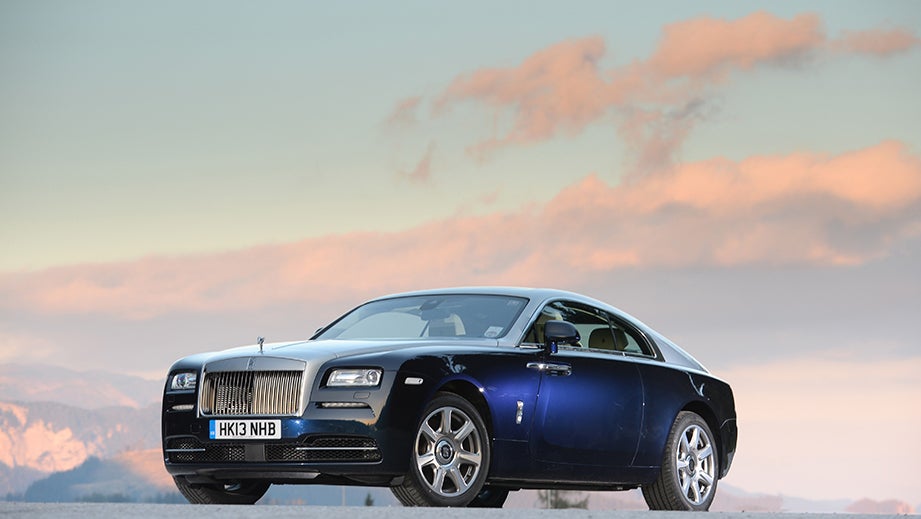 front three-quarter of a Midnight Sapphire Rolls-Royce Wraith