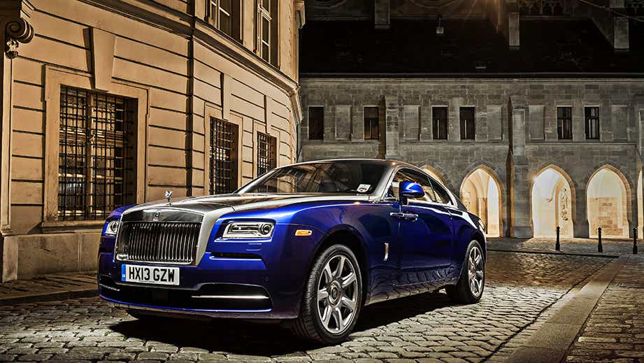 front three-quarter view of a Midnight Sapphire Rolls-Royce Wraith