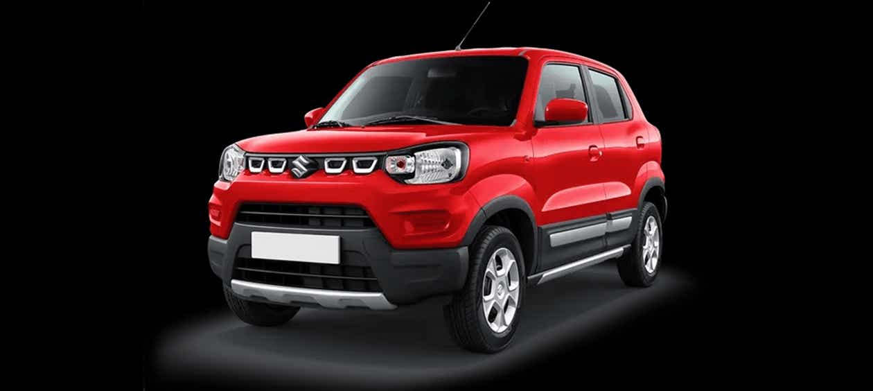 front three-quarter of a Solid Fire Red Maruti Suzuki S-Presso