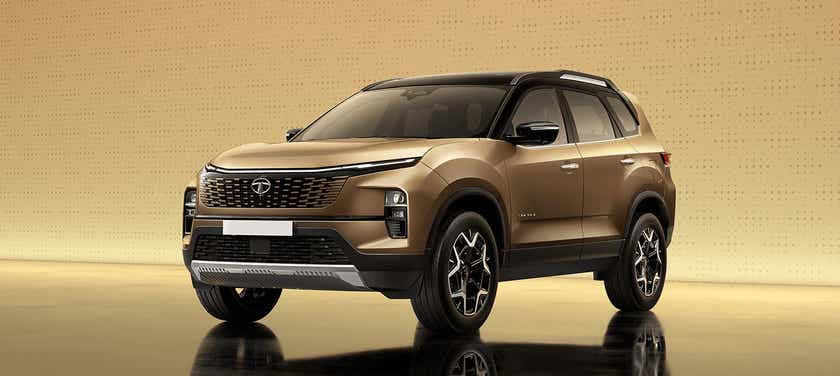 Front three-quarter view of a Cosmic Gold Tata Safari