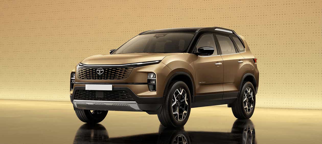 Front three-quarter view of a Cosmic Gold Tata Safari