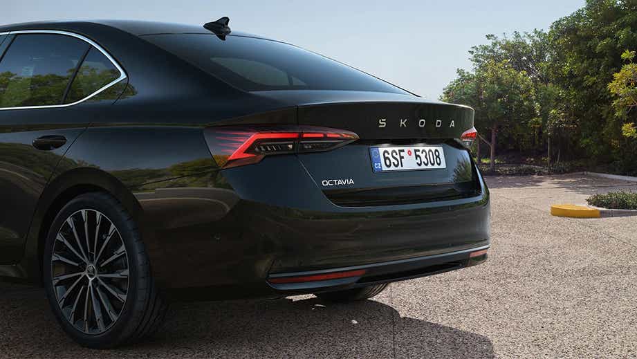 rear three-quarter of a Toffee Brown Skoda Octavia Facelift