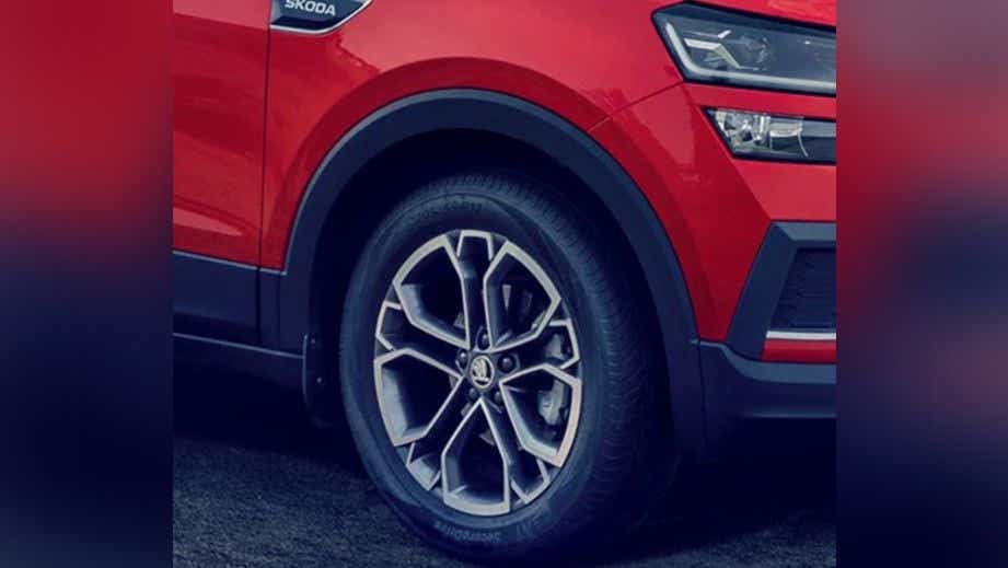 Front wheel and headlight view of a Skoda Kushaq