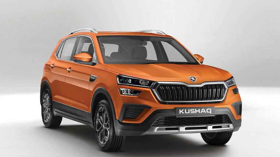 front three-quarter view of a Honey Orange Skoda Kushaq