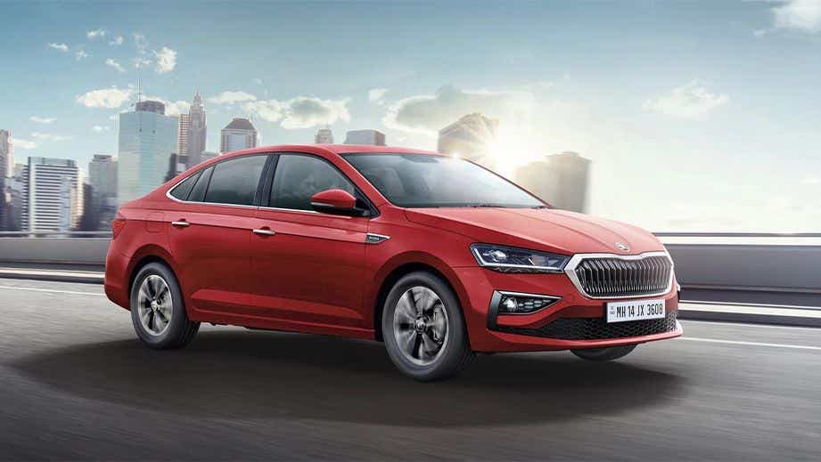 front three-quarter view of a Tornado Red Skoda Slavia