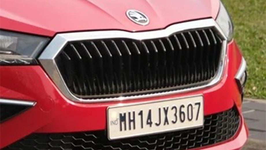 front grille view of a Tornado Red Skoda Slavia