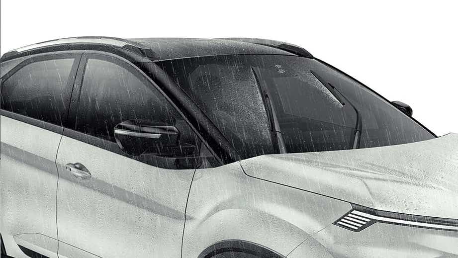 front three-quarter of a Pristine White Dual Tone Tata Nexon EV