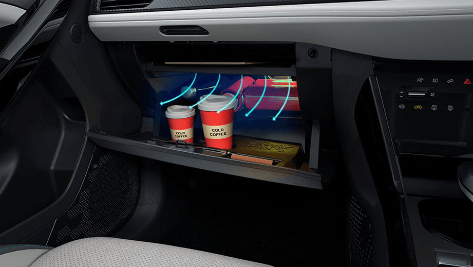 Glovebox compartment of a Tata Nexon EV showing beverage storage