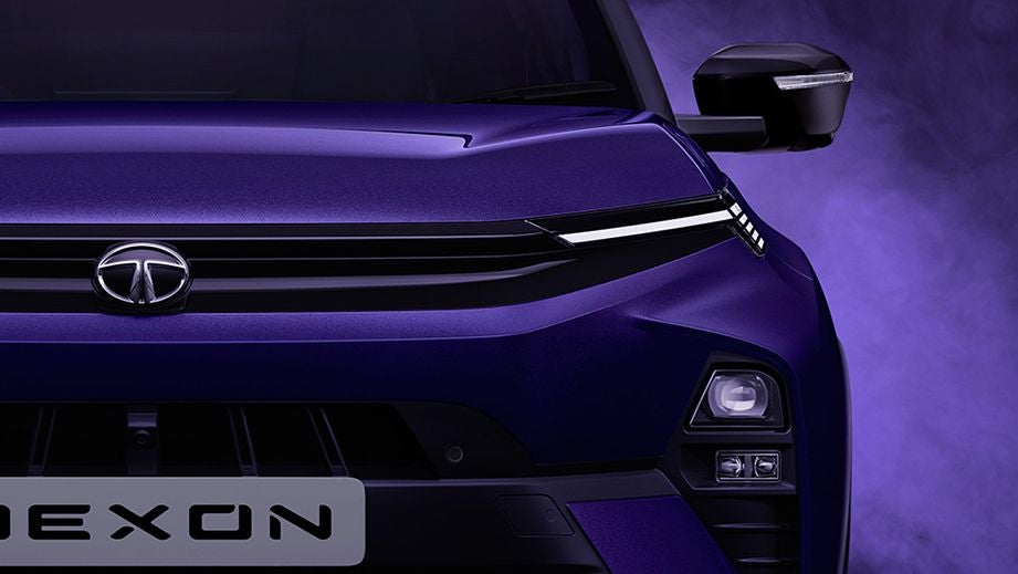 Front view of a Royal Blue Tata Nexon