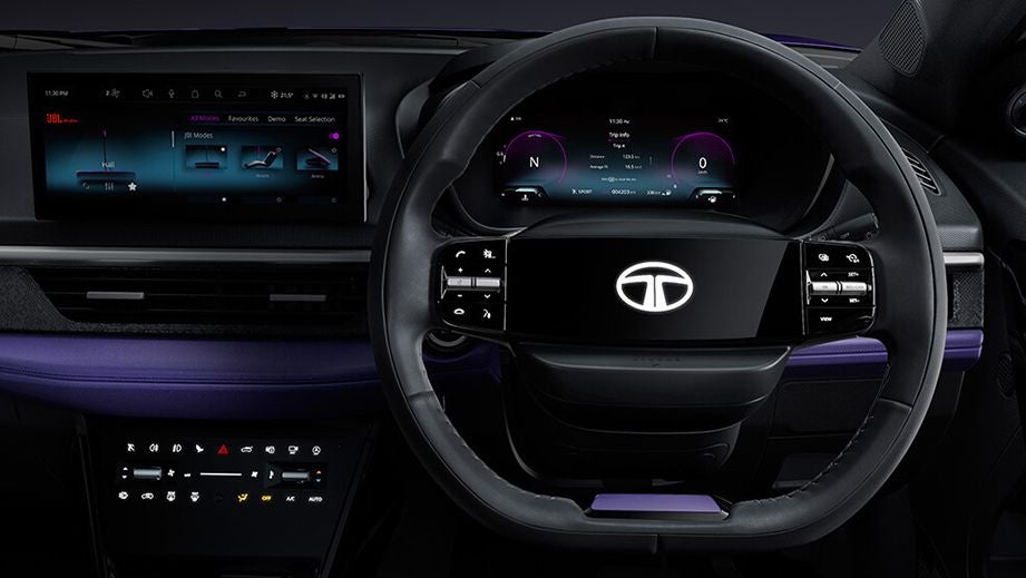 Dashboard and steering wheel view of a Tata Nexon