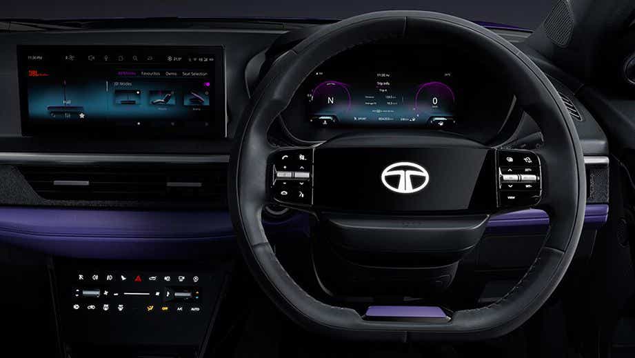 Dashboard and steering wheel view of a Tata Nexon