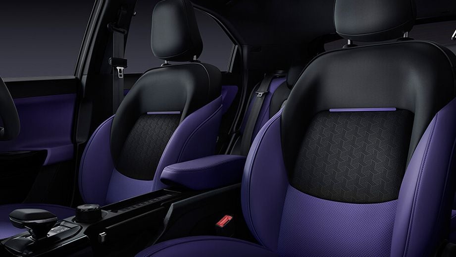 Front seats and dashboard of a Tata Nexon interior