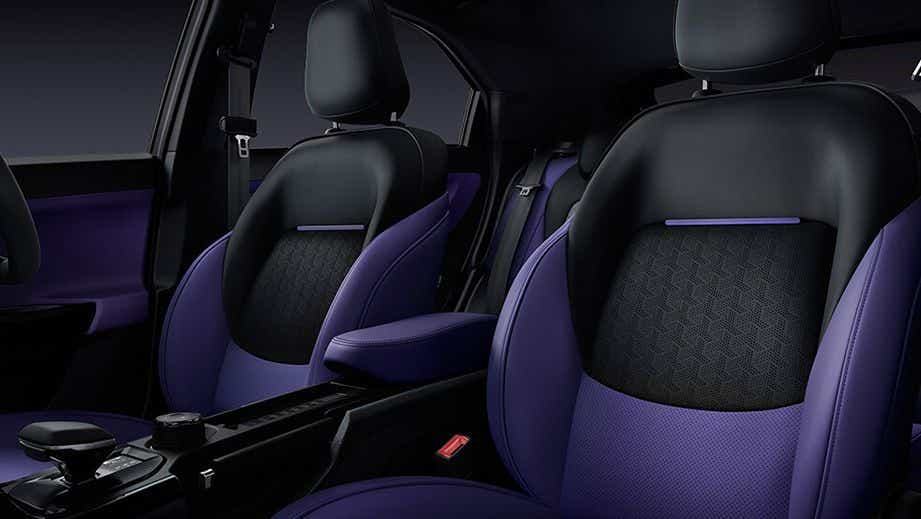 Front seats and dashboard of a Tata Nexon interior