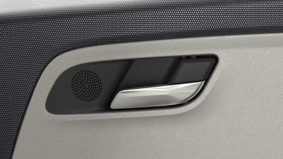 interior door handle and speaker area of a Tata Altroz