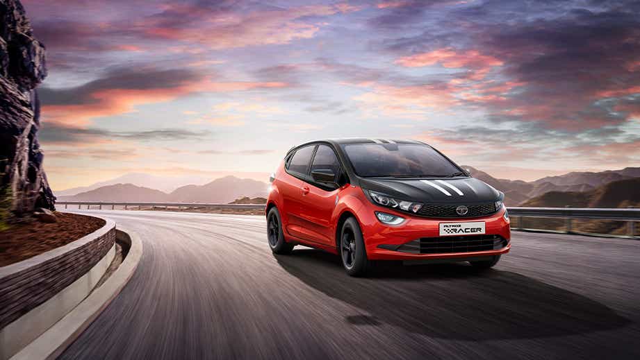 front three-quarter view of a Atomic Orange Dual Tone Tata Altroz Racer