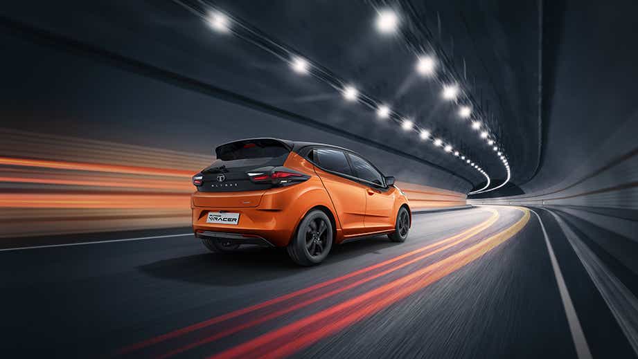 rear three-quarter view of a Atomic Orange Dual Tone Tata Altroz Racer